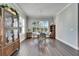 Charming dining room features a table for four and wood flooring at 1308 Alhambra Dr, Apollo Beach, FL 33572