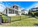 House back with large yard and fence at 1308 Alhambra Dr, Apollo Beach, FL 33572