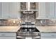 Modern kitchen features stainless steel appliances and a stylish backsplash at 1308 Alhambra Dr, Apollo Beach, FL 33572