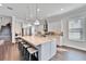 Modern kitchen with white cabinets and a large island at 1308 Alhambra Dr, Apollo Beach, FL 33572