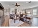 Open living area with hardwood floors and a view of the kitchen at 1308 Alhambra Dr, Apollo Beach, FL 33572
