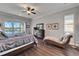 Relaxing main bedroom with water views and chaise lounge at 1308 Alhambra Dr, Apollo Beach, FL 33572