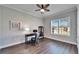 Bright home office featuring wood floors and large window at 1308 Alhambra Dr, Apollo Beach, FL 33572