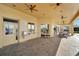 Outdoor patio with grilling station and seating area at 1308 Alhambra Dr, Apollo Beach, FL 33572