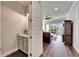 Modern powder room with granite countertop and updated vanity at 1308 Alhambra Dr, Apollo Beach, FL 33572