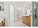 Main bathroom with double vanity, soaking tub, and shower at 14608 Mirasol Manor Ct, Tampa, FL 33626