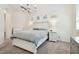 Bright bedroom featuring a queen-size bed and ample natural light at 14608 Mirasol Manor Ct, Tampa, FL 33626