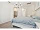 Main bedroom with large bed and walk-in closet at 14608 Mirasol Manor Ct, Tampa, FL 33626