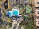 Aerial view of community pool, with surrounding amenities at 14608 Mirasol Manor Ct, Tampa, FL 33626