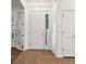 Tile entryway with white door and sidelights at 14608 Mirasol Manor Ct, Tampa, FL 33626