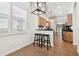 Kitchen nook with breakfast bar and view into kitchen at 14608 Mirasol Manor Ct, Tampa, FL 33626