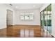 Open living space with hardwood floors and natural light at 14608 Mirasol Manor Ct, Tampa, FL 33626