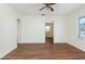 Bright living room with hardwood floors and a ceiling fan at 1575 S Martin Luther King Jr Ave, Clearwater, FL 33756