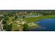 Aerial view of golf course community with lake at 1709 Marilyn Ave, Bradenton, FL 34207