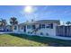 Charming ranch style home features a newly renovated exterior and well-manicured lawn at 1709 Marilyn Ave, Bradenton, FL 34207