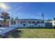 Recently renovated home featuring a modern exterior and attractive landscaping at 1709 Marilyn Ave, Bradenton, FL 34207