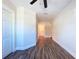 Bright hallway with wood-look floors and access to bedrooms at 1709 Marilyn Ave, Bradenton, FL 34207