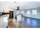 Modern kitchen with white cabinets, stainless steel appliances, and island at 1709 Marilyn Ave, Bradenton, FL 34207