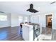 Open concept kitchen with island seating and stainless steel appliances at 1709 Marilyn Ave, Bradenton, FL 34207