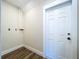 Convenient laundry room with hookups and wood-look floors at 1709 Marilyn Ave, Bradenton, FL 34207