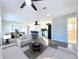 Open concept living room and kitchen with modern finishes and hardwood floors at 1709 Marilyn Ave, Bradenton, FL 34207
