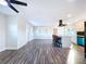 Open living space with hardwood floors and kitchen views at 1709 Marilyn Ave, Bradenton, FL 34207