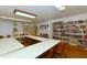 Meeting room with large table and book shelves at 1709 Marilyn Ave, Bradenton, FL 34207