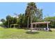 Covered picnic areas with tables and benches at 1709 Marilyn Ave, Bradenton, FL 34207