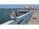 Pelican on railing overlooking calm water and pier at 1709 Marilyn Ave, Bradenton, FL 34207