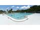 Community pool with lanes and surrounding area at 1709 Marilyn Ave, Bradenton, FL 34207