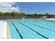 Community pool with lanes and surrounding area at 1709 Marilyn Ave, Bradenton, FL 34207