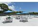 Community pool area with tables and chairs at 1709 Marilyn Ave, Bradenton, FL 34207