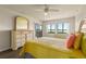 Bedroom with water views and a dresser at 1812 Mariner Dr # 137, Tarpon Springs, FL 34689