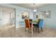 Dining area with table and chairs, near kitchen at 1812 Mariner Dr # 137, Tarpon Springs, FL 34689