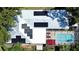 Home features solar panels and a screened pool at 1926 Burlington N Ave, St Petersburg, FL 33713