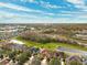 Aerial view of community with pond and preserve at 20716 Amanda Oak Ct, Land O Lakes, FL 34638