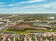 Aerial view of community with pond and preserve at 20716 Amanda Oak Ct, Land O Lakes, FL 34638