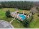 Community pool with gazebo and lounge area at 20716 Amanda Oak Ct, Land O Lakes, FL 34638