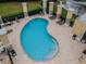 Relaxing kidney-shaped community pool at 20716 Amanda Oak Ct, Land O Lakes, FL 34638
