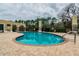 Inviting community pool with lounge chairs at 20716 Amanda Oak Ct, Land O Lakes, FL 34638