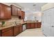Modern kitchen with granite countertops and stainless steel appliances at 20716 Amanda Oak Ct, Land O Lakes, FL 34638