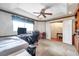 Spacious bedroom with a desk, bed, and ample closet space at 2292 Austrian Ln # 22, Clearwater, FL 33763