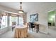 Charming dining area with bay window and round table at 2292 Austrian Ln # 22, Clearwater, FL 33763