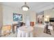 Dining area with table, chairs and access to other rooms at 2292 Austrian Ln # 22, Clearwater, FL 33763