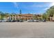 Front view of a two-story building with several units and ample parking at 2292 Austrian Ln # 22, Clearwater, FL 33763