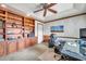 Bright home office features built-in shelves and a large desk at 2292 Austrian Ln # 22, Clearwater, FL 33763