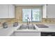 Clean kitchen sink with stainless steel fixtures at 2292 Austrian Ln # 22, Clearwater, FL 33763