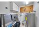 Laundry room with washer, dryer and storage at 2292 Austrian Ln # 22, Clearwater, FL 33763