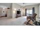 Living room with a comfortable armchair and exercise bike at 2292 Austrian Ln # 22, Clearwater, FL 33763