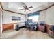 Bright home office featuring a desk, chair, and built-in shelving at 2292 Austrian Ln # 22, Clearwater, FL 33763